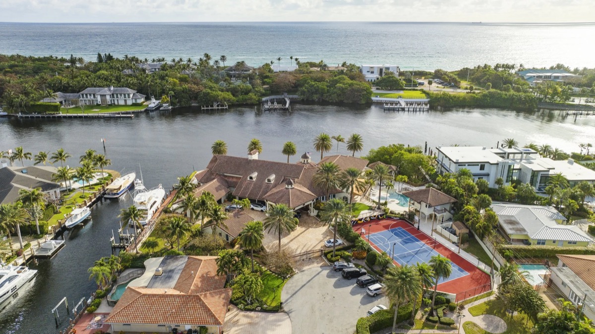 Aerial drone photo of luxury South Florida waterfront estate, produced by Flylisted, the real estate marketing agency that automated outbound with Staffify and booked $230K+ in 9 months